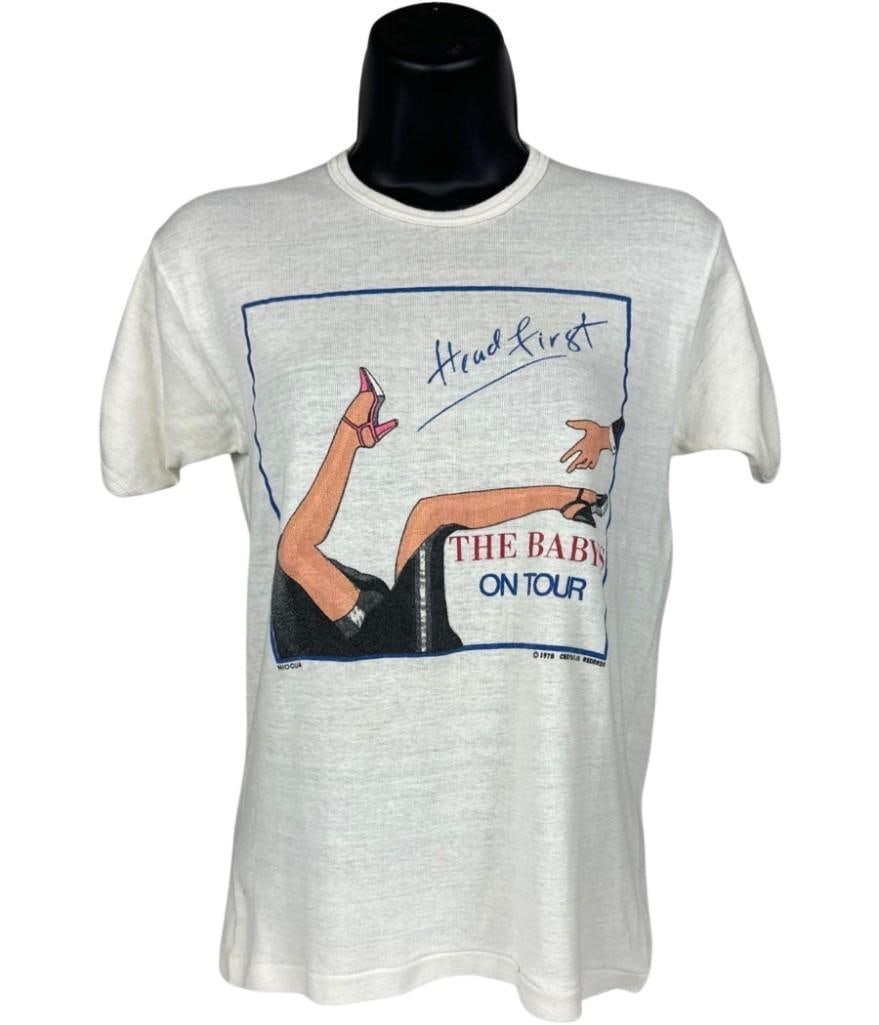 The Babys Vintage "Head First The Babys On Tour" T-Shirt (Chip Rachlin Collection): Vintage original white, blue, and black mens size XL 22.75" x 15.5" the Babys "Head First The Babys On Tour" t-shirt. The front features a color illustrated cover of the bands "Head First" album