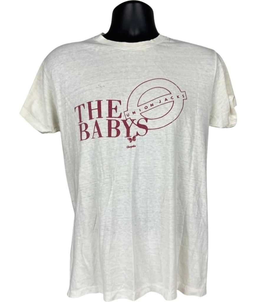 The Babys Vintage "Union Jacks" T-Shirt (Chip Rachlin Collection): Vintage original white mens size large 28" x 19" The Babys t-shirt, featuring their band name and album title "Union Jacks" written large on the front. In very good condition, with some signs of