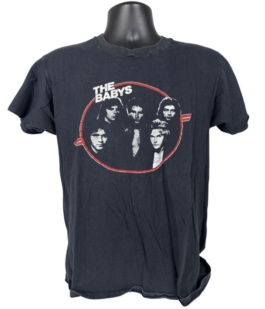 The Babys Vintage Concert T-Shirt (Chip Rachlin Collection): Vintage original black men size XL 25" x 17" "The Babys" band cotton t-shirt, featuring the band name and members on the front. In fine condition. Provenance: From the personal collection of music ind
