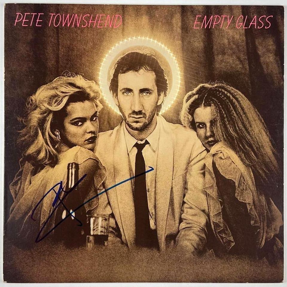 The Who: Pete Townshend Signed "Empty Glass" Album (JSA Authentication): "Empty Glass" album signed on the cover in blue felt tip marker by The Who band member Pete Townshend. Measuring approximately 12" x 12" and in fine condition. Record is included. Provenance This
