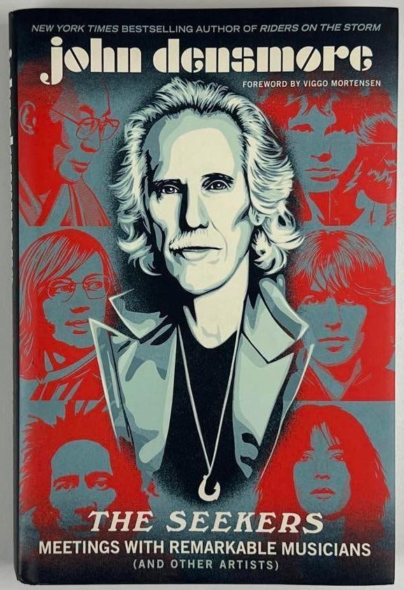 The Doors: John Densmore Signed "The Seekers: Meetings With Remarkable Musicians" Book (JSA): Color hardcover 9.25" x 6.25" "The Seekers: Meetings With Remarkable Musicians" book signed on the inside front page in black felt tip marker by The Doors band member John Densmore. In fine condition.
