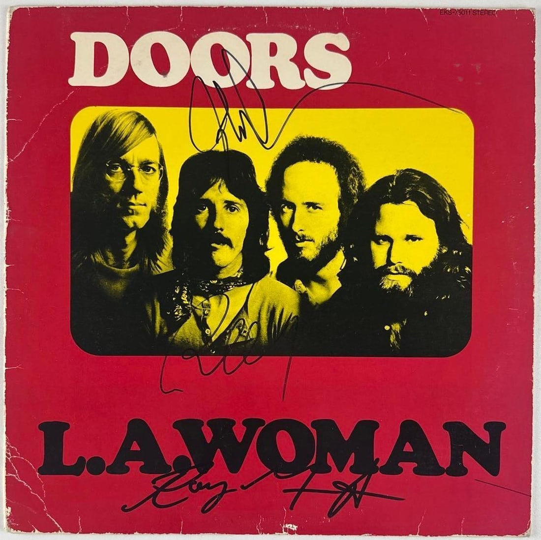 The Doors Group Signed "L.A. Woman" Album (3 Sigs) (Beckett Authentication): "L.A. Woman" album signed on the cover in black felt tip marker by The Doors band members Ray Manzarek, Robby Krieger, and John Densmore. Measuring approximately 12" x 12" and in very good condition,