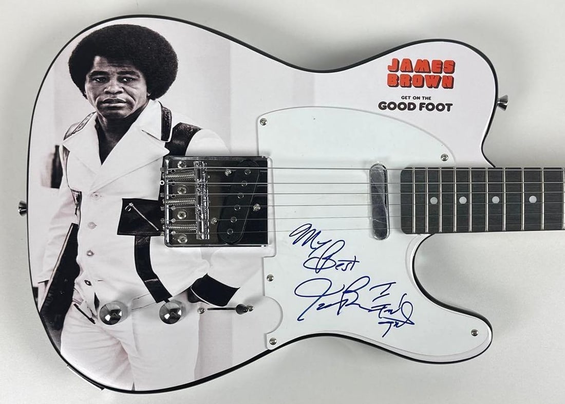 James Brown Signed "Get on the Good Foot" Custom Graphics Telecaster-Style Guitar (JSA Auth.): "Get on the Good Foot" custom graphics Telecaster-style guitar signed on the pickguard in blue felt tip marker by musician James Brown. Measuring approximately 39" x 13" and in fine condition.