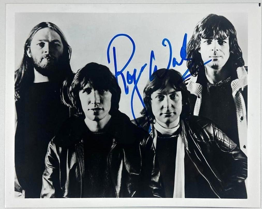 Pink Floyd: Roger Waters Signed 8" x 10" Photo (JSA Authentication): Black-and-white 8" x 10" photo signed in blue felt tip marker by Pink Floyd band member Roger Waters. In fine condition. Authenticated by JSA. Provenance This piece was recently authenticated by JSA
