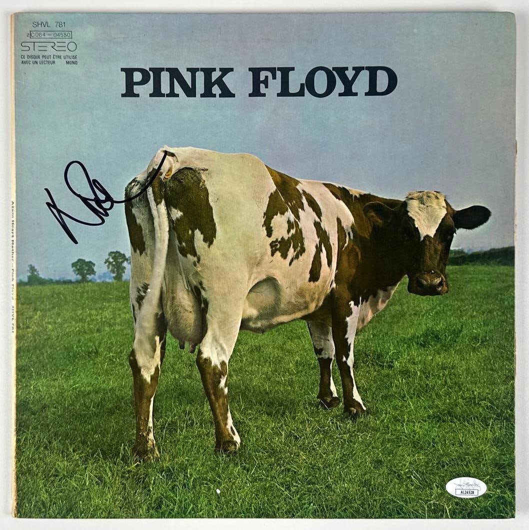Nick Mason Signed Pink Floyd "Atom Heart Mother" Album (JSA Authentication): "Atom Heart Mother" album signed on the cover in black felt tip marker by Pink Floyd band member Nick Mason. Measuring approximately 12" x 12" and in good condition with minor signs of handling and