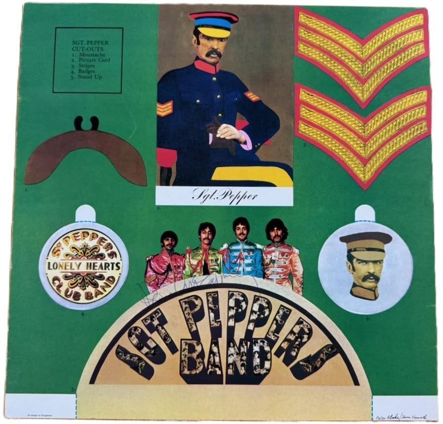 The Beatles: Paul McCartney Signed "Sgt. Pepper's Lonely Hearts Club Band" Album Insert (JSA): "Sgt. Pepper's Lonely Hearts Club Band" album insert signed in blue ballpoint pen by the Beatles band member Paul McCartney. Measuring approximately 12" x 12" and in fine condition. Authenticated by J