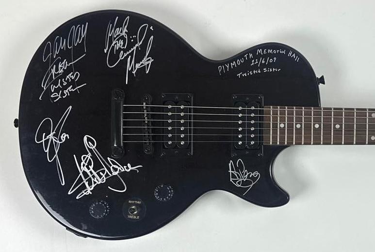 Twisted Sister Classic Lineup Signed Epiphone Special-II Electric Guitar (5 Sigs) (JSA): Black Epiphone Special-II electric guitar signed directly on the body in silver felt tip marker by all five members of Twisted Sister's classic lineup: Eddie Ojeda, Mark Mendoza, Jay Jay French, Dee S
