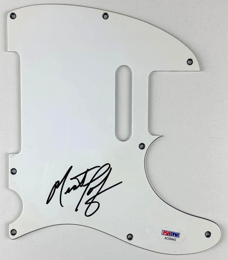 Meat Loaf Signed Telecaster-Style Pickguard (PSA/DNA Authentication): White 8.5" x 7.5" Telecaster-style pickguard signed in black felt tip marker by musician Meat Loaf. In fine condition. Accompanied by a PSA/DNA COA (#AC59443).