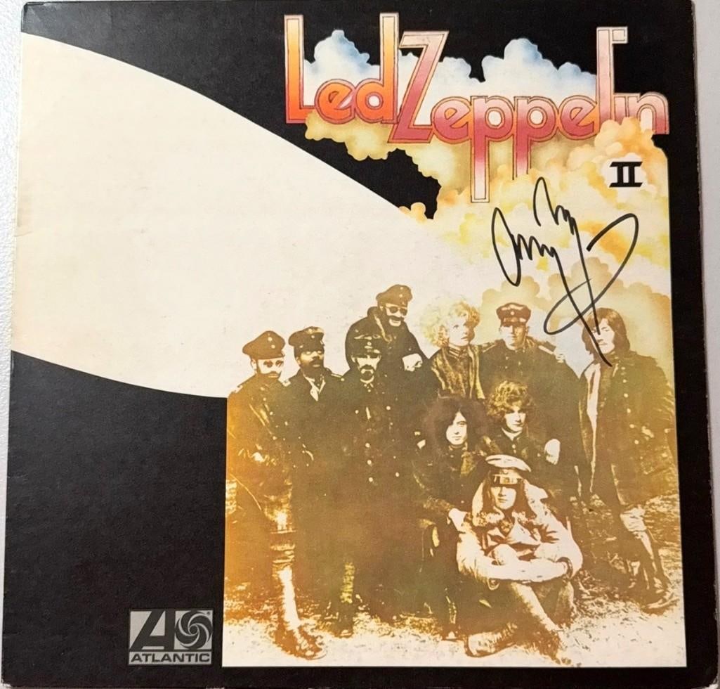 Led Zeppelin: Jimmy Page Signed "Led Zeppelin II" Album (Grad Authentication): "Led Zeppelin II" album signed on the cover in black felt tip marker by Led Zeppelin guitarist Jimmy Page. Measuring approximately 12" x 12" and in very good condition, with some scattered wear.