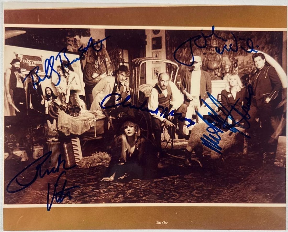 Fleetwood Mac Group Signed 8" x 10" Photo (5 Sigs) (JSA Authentication): Color 8" x 10" photo signed in blue felt tip marker by Fleetwood Mac band members Mick Fleetwood, Christine McVie, John McVie, Rick Vito, and Billy Burnette. In fine condition. Accompanied by a full