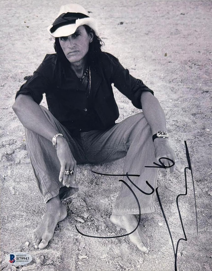 Aerosmith: Joe Perry Signed 10" x 8" Photo (Beckett Authentication): Black-and-white 10" x 8" photo signed in black felt tip marker by Aerosmith band member Joe Perry. In fine condition. Authenticated by Beckett, with their official hologram affixed to the back bottom