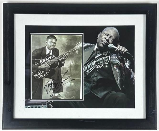 B.B. King Signed 10" x 8" Photo Framed Display (ACOA Authentication): Black-and-white 10" x 8" photo framed display signed in black felt tip marker by musician B.B. King. Signed photo measures 10" x 8" and is displayed in a frame measuring 18.75" x 22.75" overall. In