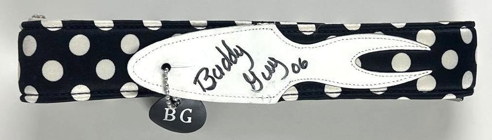 Buddy Guy Signed 53" x 2" Dog Collar (Third Party Guaranteed): Black-and-white polka-dot 53" x 2" dog collar signed on the white leather end piece in black felt tip marker by musician Buddy Guy, who inscribed the year "06" after his signature. In fine condition.
