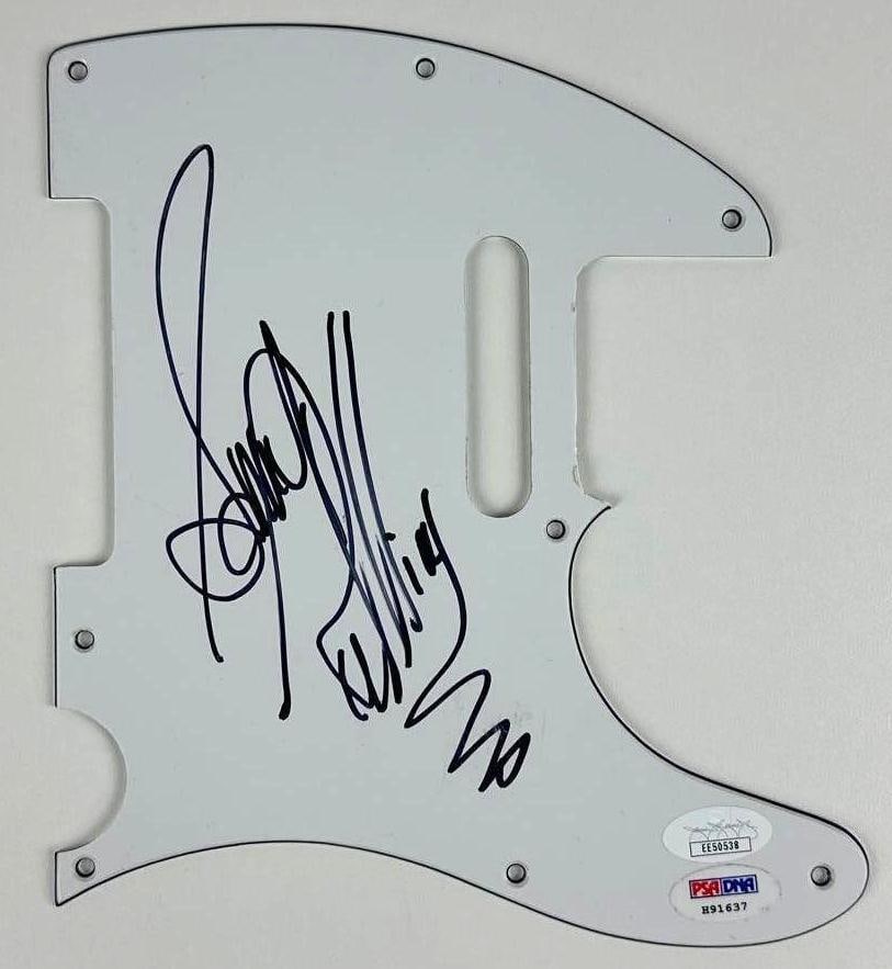 Sonny Rollins Signed Telecaster-Style Pickguard (JSA & PSA/DNA Authentication): White 9" x 7.5" Telecaster-style pickguard signed on the front in black felt tip marker by musician Sonny Rollins. In fine condition. Accompanied by a JSA COA (#EE50538) and a PSA/DNA COA (#H91637).