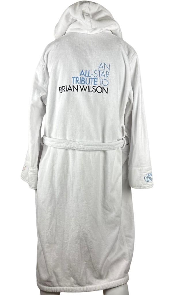 The Beach Boys: "A Tribute to Brian Wilson" Personalized Bathrobe (Chip Rachlin Collection): White cotton terrycloth bathrobe personalized with the name 'Alex' in blue text on the right breast. The back has the text "A Tribute to Brian Wilson" large across the back, with the name in black
