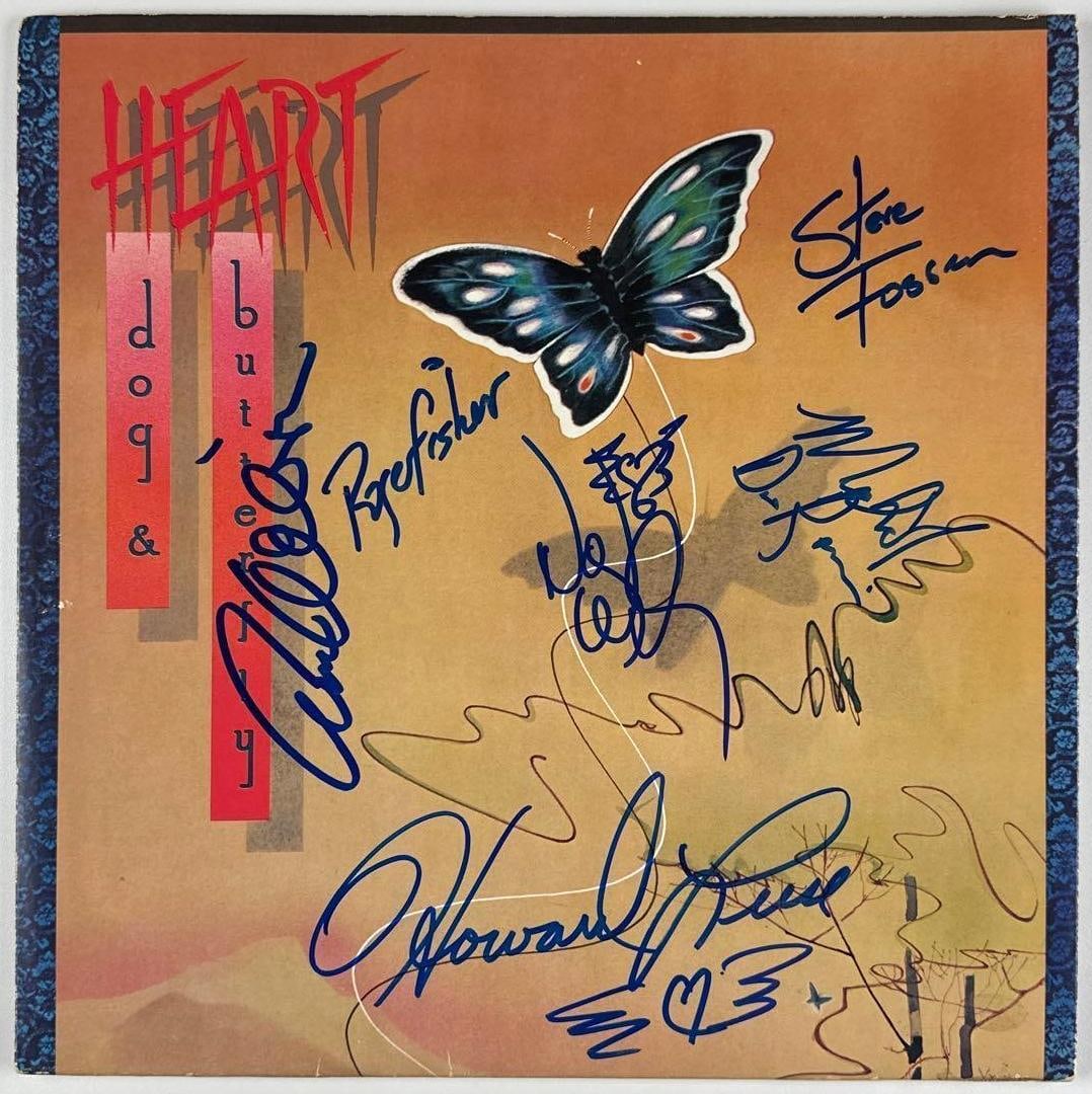 Heart Group Signed "Dog & Butterfly" Album (6 Sigs) (Third Party Guaranteed): Heart’s Dog & Butterfly album, signed prominently on the cover in blue felt-tip marker by Ann Wilson, Nancy Wilson, Roger Fisher, Howard Leese, Steve Fossen, and Michael Derosier, representing