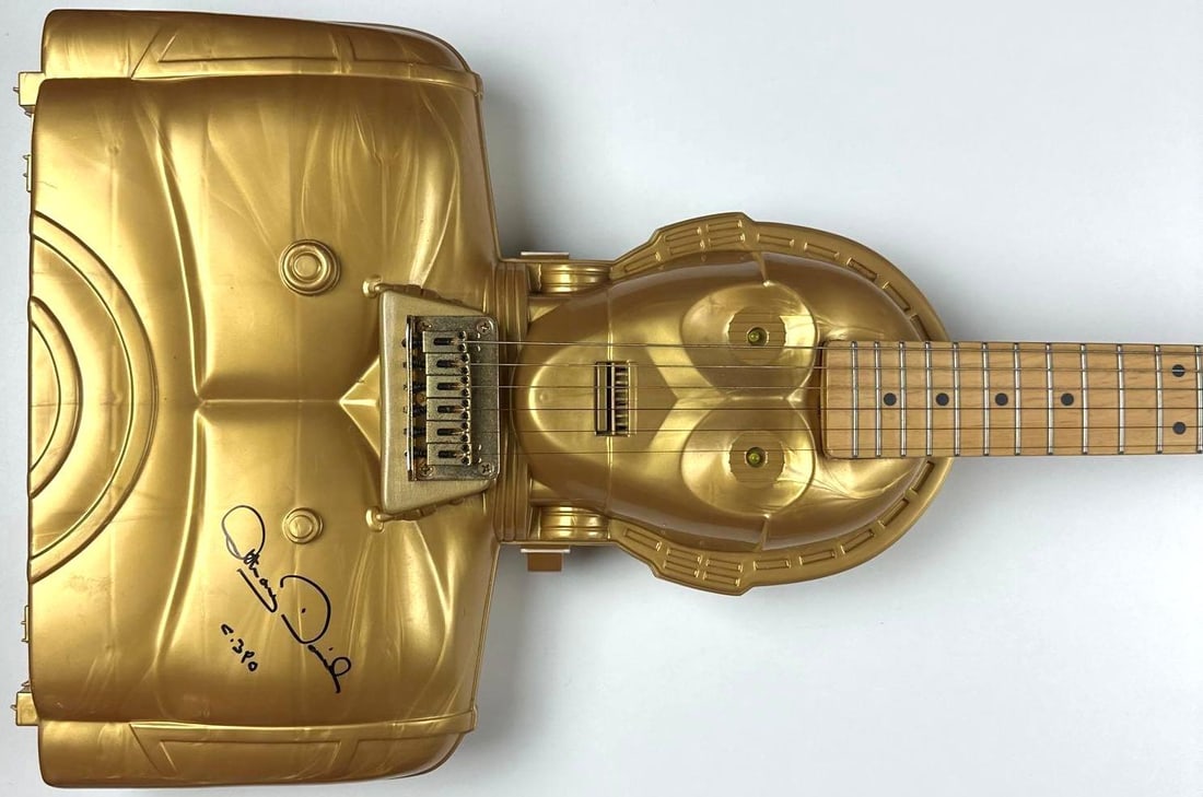 Star Wars: Anthony Daniels Signed Custom C-3PO Designed Guitar (Third Party Guaranteed): Golden custom made "Star Wars" C-3PO designed guitar signed on the body in black felt tip marker by actor Anthony Daniels, who inscribed his character's name "C-3PO" after his signature. Measuring