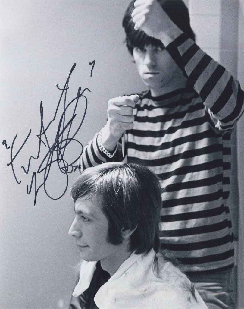 Rolling Stones: Charlie Watts Signed 10" x 8" Photo (ACOA Authentication): Black-and-white 10" x 8" photo signed in black felt tip marker by the Rolling Stones band member Charlie Watts. In fine condition. Accompanied by an ACOA COA (#SB30325).