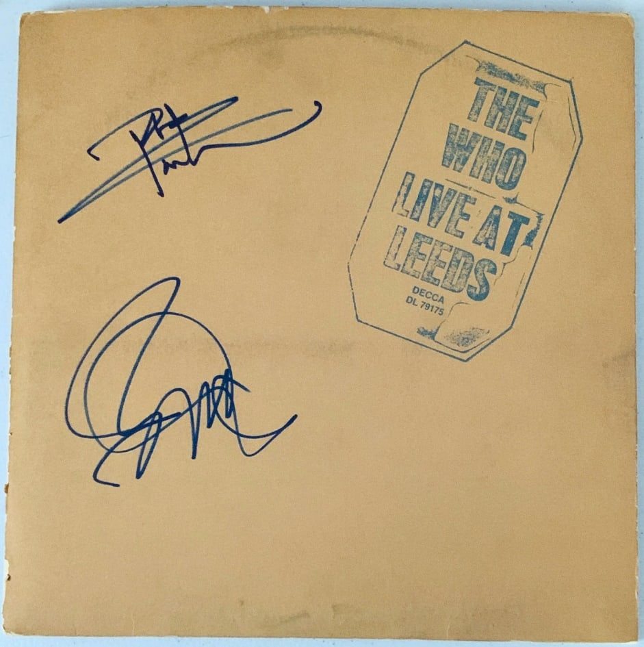 The Who Group Signed "Live at Leeds" Album (2 Sigs) (Beckett Authentication): "Live at Leeds" album signed on the cover in blue felt tip marker by The Who band members Pete Townshend and Roger Daltrey. Measuring approximately 12" x 12" and in very good condition, with some