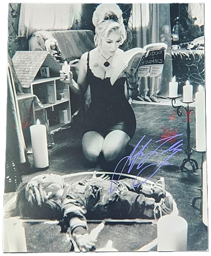 Bride of Chucky: Jennifer Tilly Signed 10" x 8" Photo as Tiffany (Third Party Guaranteed): Black-and-white 10" x 8" photo of the character Tiffany from the film "Bride of Chucky" signed in purple paint pen by actress Jennifer Tilly. In fine condition. Obtained in-person. Provenance Eaton &