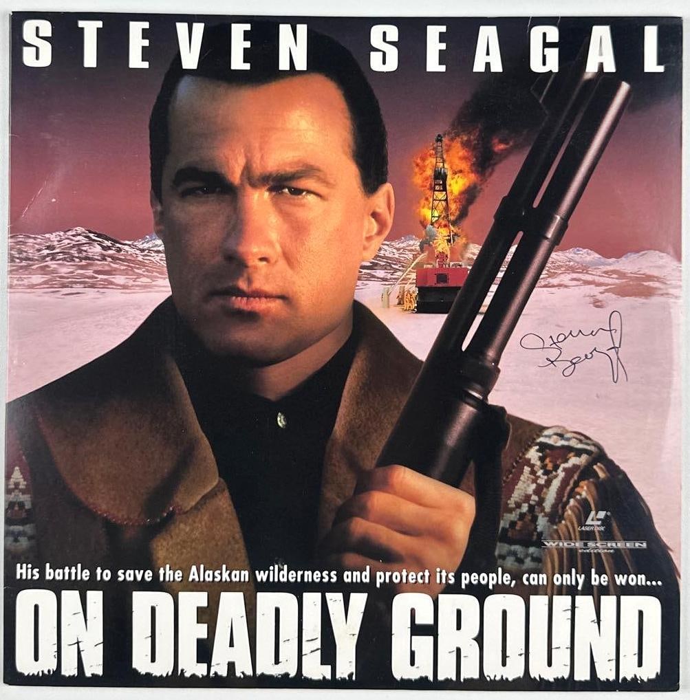 Steven Seagal Signed "On Deadly Ground" Soundtrack Album (Third Party Guaranteed): "On Deadly Ground" soundtrack album signed on the cover in black ballpoint pen by actor Steven Seagal. Measuring approximately 12" x 12" and in fine condition. Record is included. Provenance Eaton &