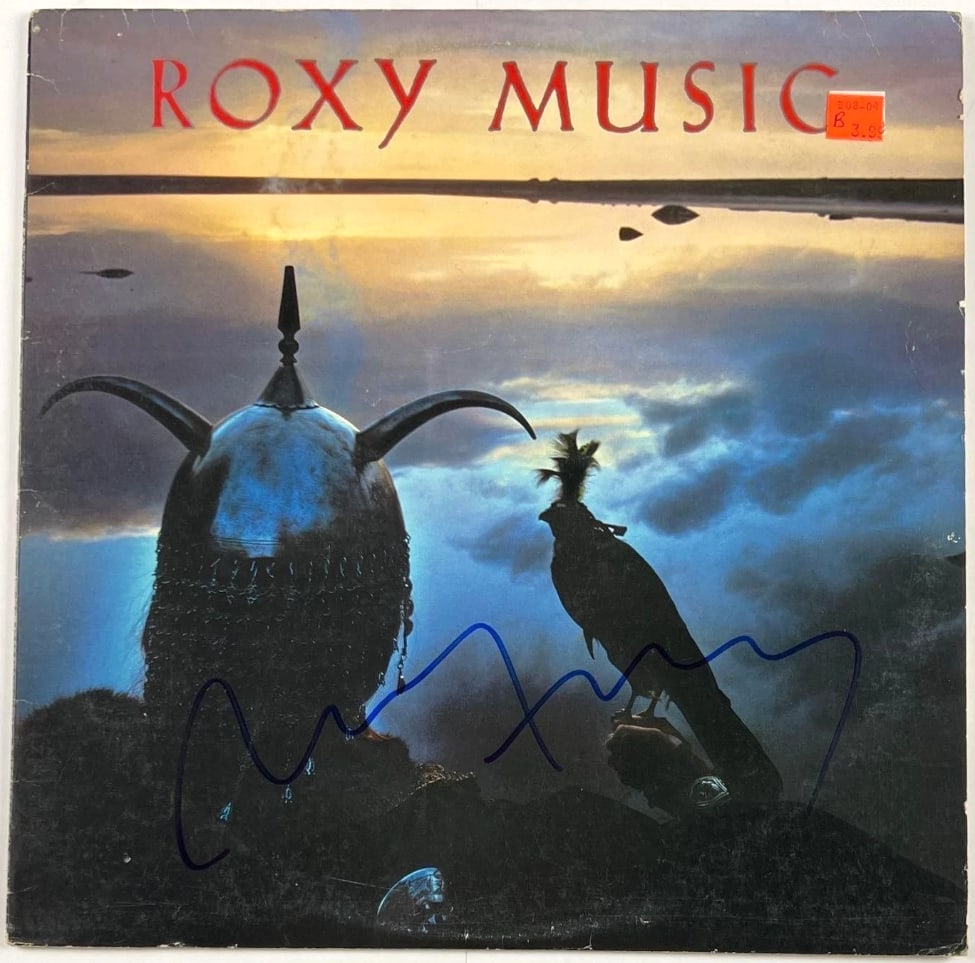 Roxy Music: Bryan Ferry Signed "Avalon" Album (Beckett Authentication): "Avalon" album signed on the cover in blue felt tip marker by Roxy Music band member Bryan Ferry. Measuring approximately 12" x 12" and in very good condition, with some signs of scattered wear.