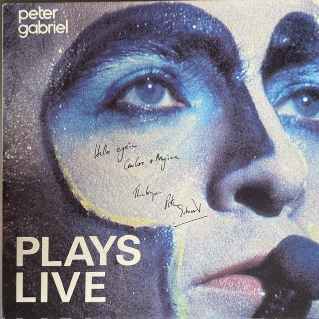 Genesis: Peter Gabriel Signed "Peter Gabriel Plays Live" Double LP Album (Third Party): "Peter Gabriel Plays Live" double LP album signed on the cover in black ballpoint pen by musician Peter Gabriel, who inscribed "Hello" before his signature. Measuring approximately 12" x 12" and in fi