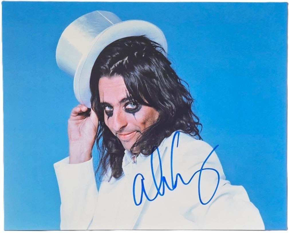 Alice Cooper Signed 8" x 10" Photo (Third Party Guaranteed): Color 8" x 10" photo signed in blue felt tip marker by musician Alice Cooper. In fine condition. Obtained in-person. Provenance Eaton & Brennan Auctions guarantees this lot to pass Third-Party