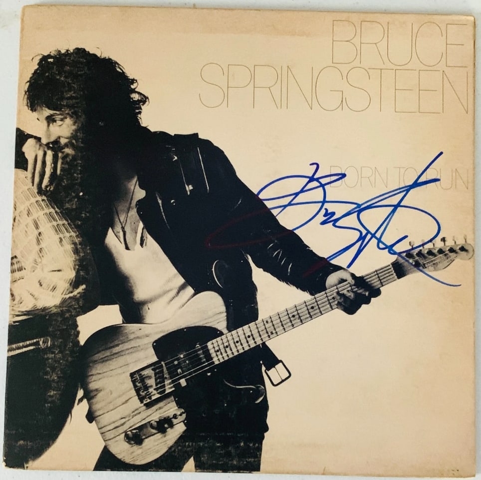 Bruce Springsteen Signed "Born to Run" Album (Beckett Authentication): "Born to Run" album signed on the cover in blue felt tip marker by musician Bruce Springsteen. Measuring approximately 12" x 12" and in very good condition, with some overall scattered toning and