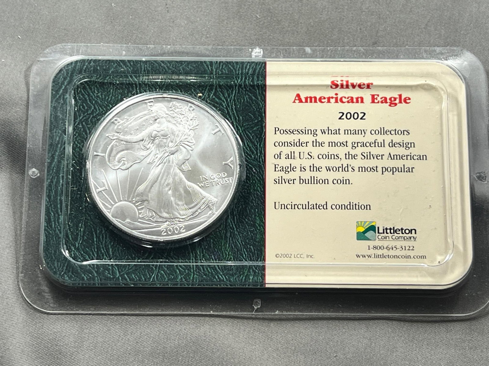 2002 US Silver Eagle Dollar Coin, .999 Fine Silver in Littleton Holder (1 of 2)