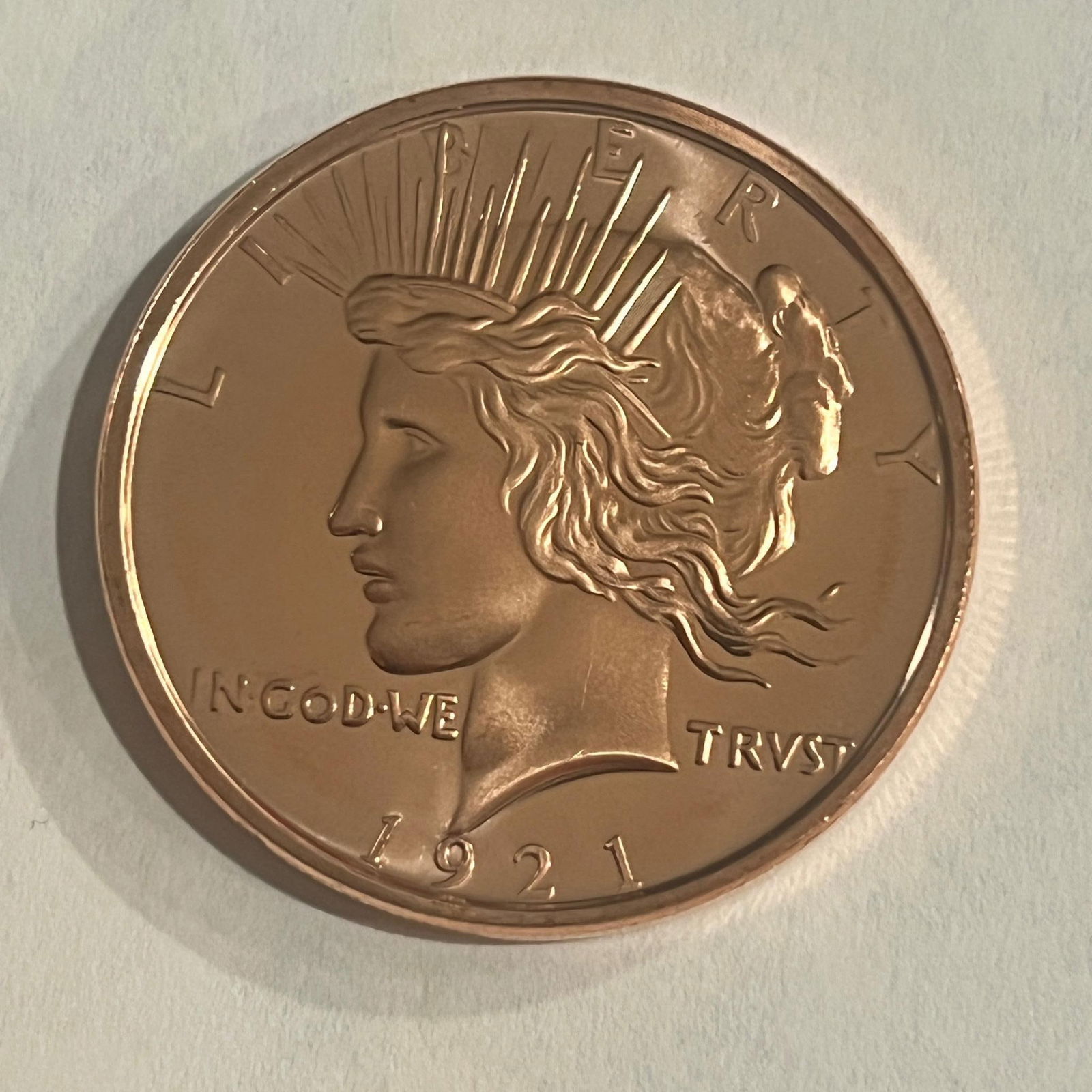 ONE OUNCE .999 COPPER ROUND, MADE IN THE LIKENESS OF A 1921 PEACE DOLLAR (1 of 2)