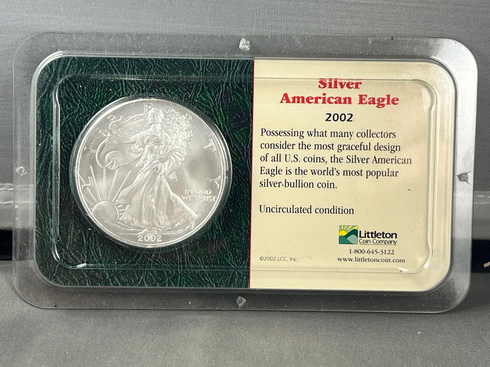 2002 US Silver Eagle Dollar Coin, .999 Fine Silver in Littleton Holder (1 of 2)