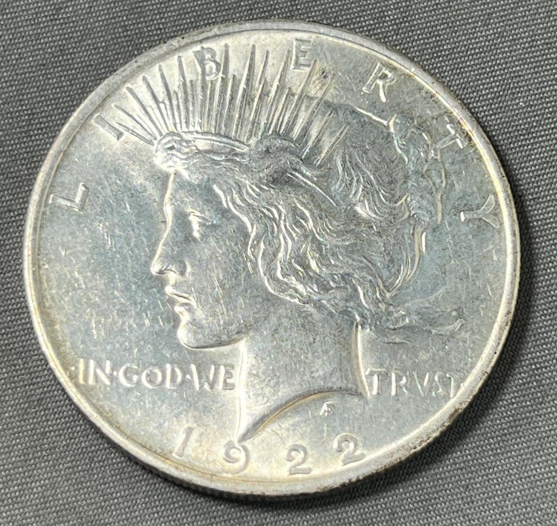 1922 Peace Silver Dollar, 90% Silver: Please see all pics for condition, grade, and completeness of albums. Please ask questions if you have them and request additional photos if necessary.
