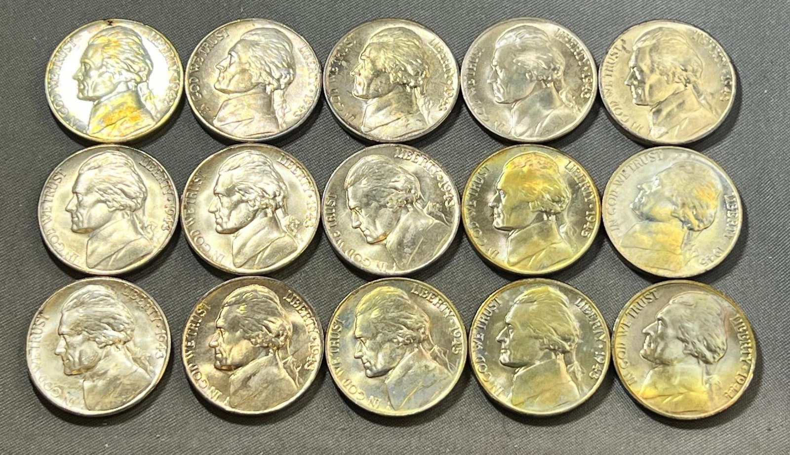 15- 35% Silver Jefferson War Nickels, most are AU quality: Please see all pics for condition, grade, and completeness of albums. Please ask questions if you have them and request additional photos if necessary.