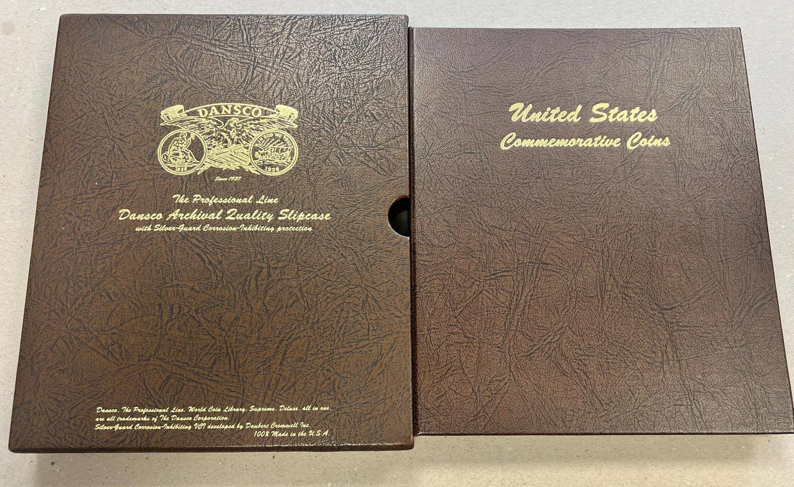 Dansco Commemorative Coins Album w/ slip cover, includes 6 var. date Booker T Washington Half Dol...: Please see all pics for condition, grade, and completeness of albums. Please ask questions if you have them and request additional photos if necessary.