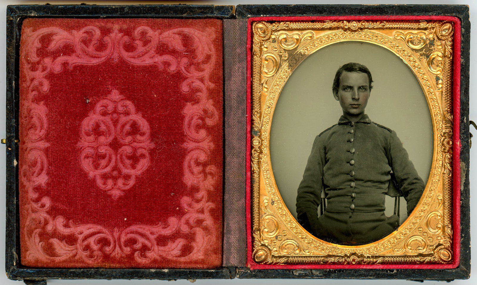 Ambrotype of a Civil War Confederate Soldier: Step into the annals of Civil War history with this captivating sixth plate ambrotype featuring a Confederate soldier. The soldier's uniform and the intensity in his gaze transport us to a time of uph
