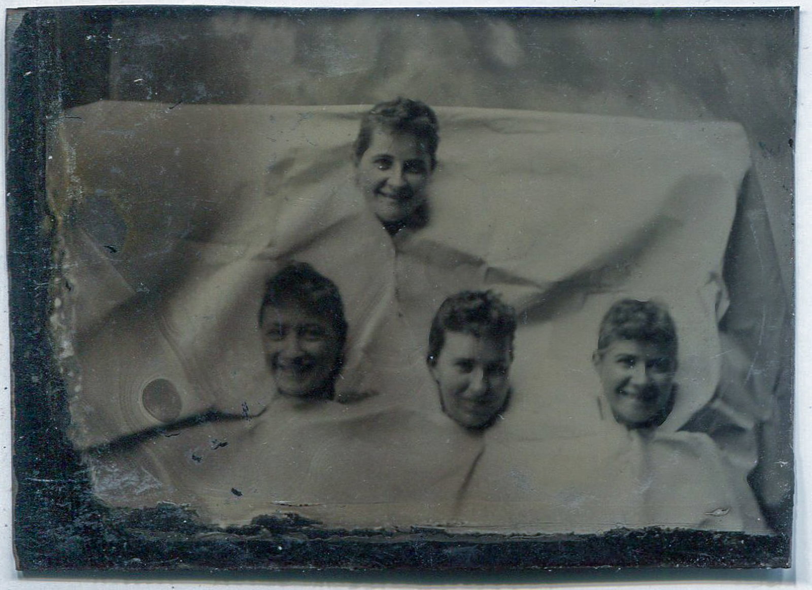 Tintype of a Group of Four with Head Through Paper (1 of 1)
