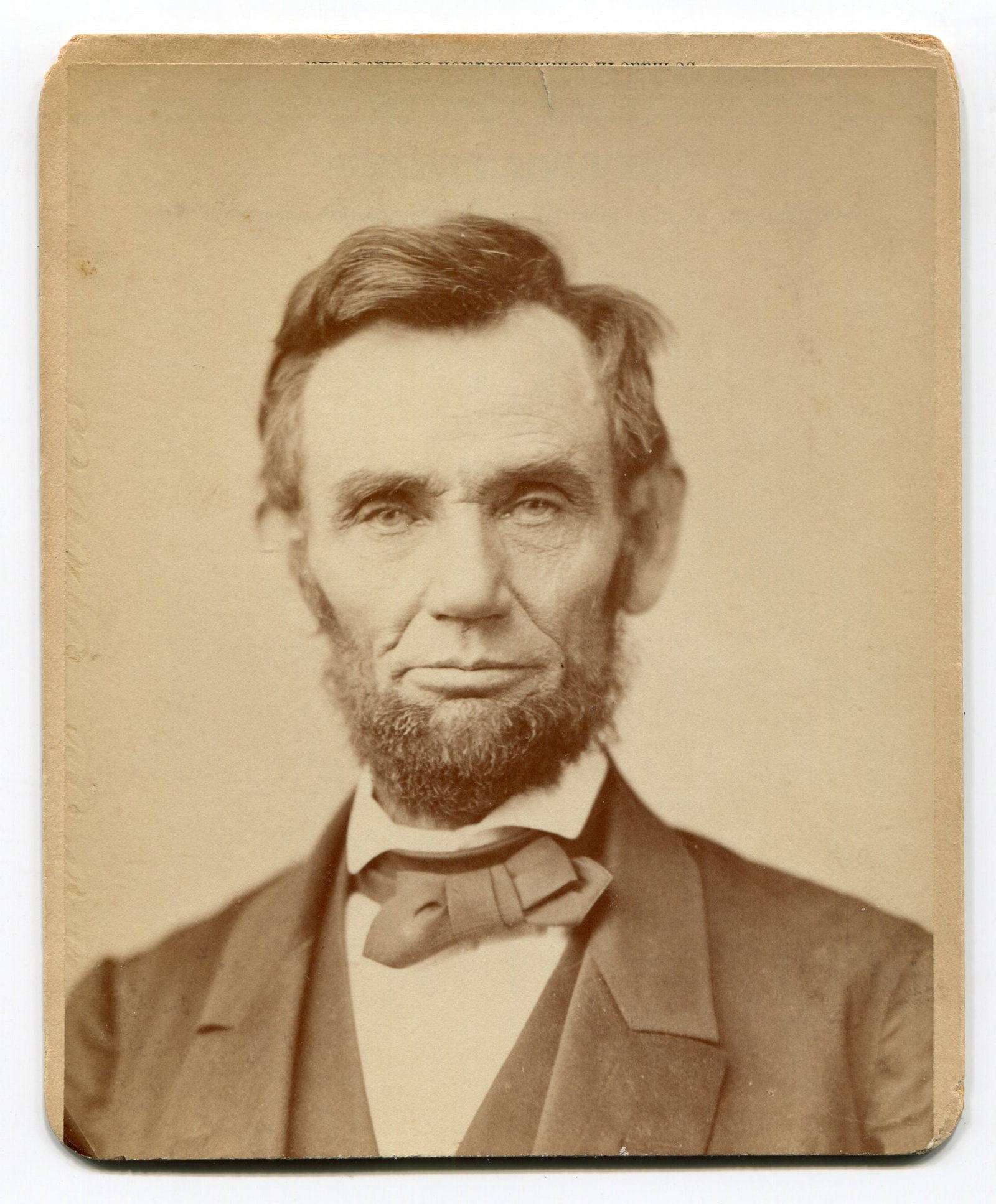 Abraham Lincoln Cabinet Card: A cabinet card photograph of Abraham Lincoln, most likely taken by the renowned Civil War photographer Alexander Gardner on November 15, 1863, as noted on the reverse inscription. Cabinet cards were a