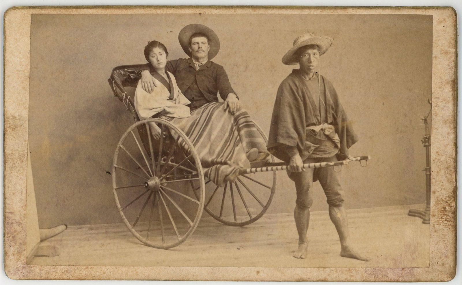 CDV of Mixed-Race Couple in rickshaw with Japanese Puller (1 of 2)