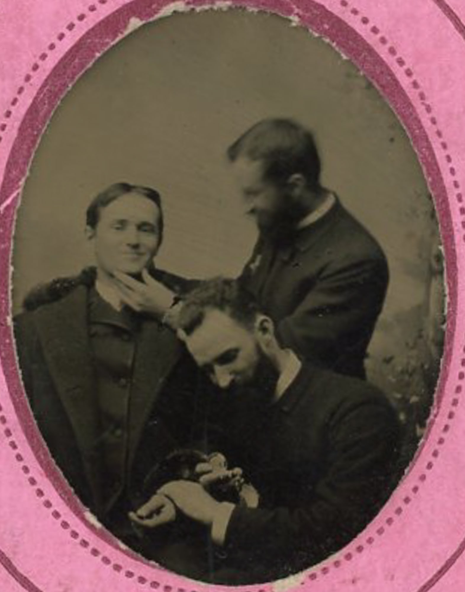 Ninth Plate Tintype Medical Examination Scene: Tintype photograph showing three men posed in a studio setting, two examining a seated man while a third manipulates a small instrument or device in the subject’s hand. The image appears to depict