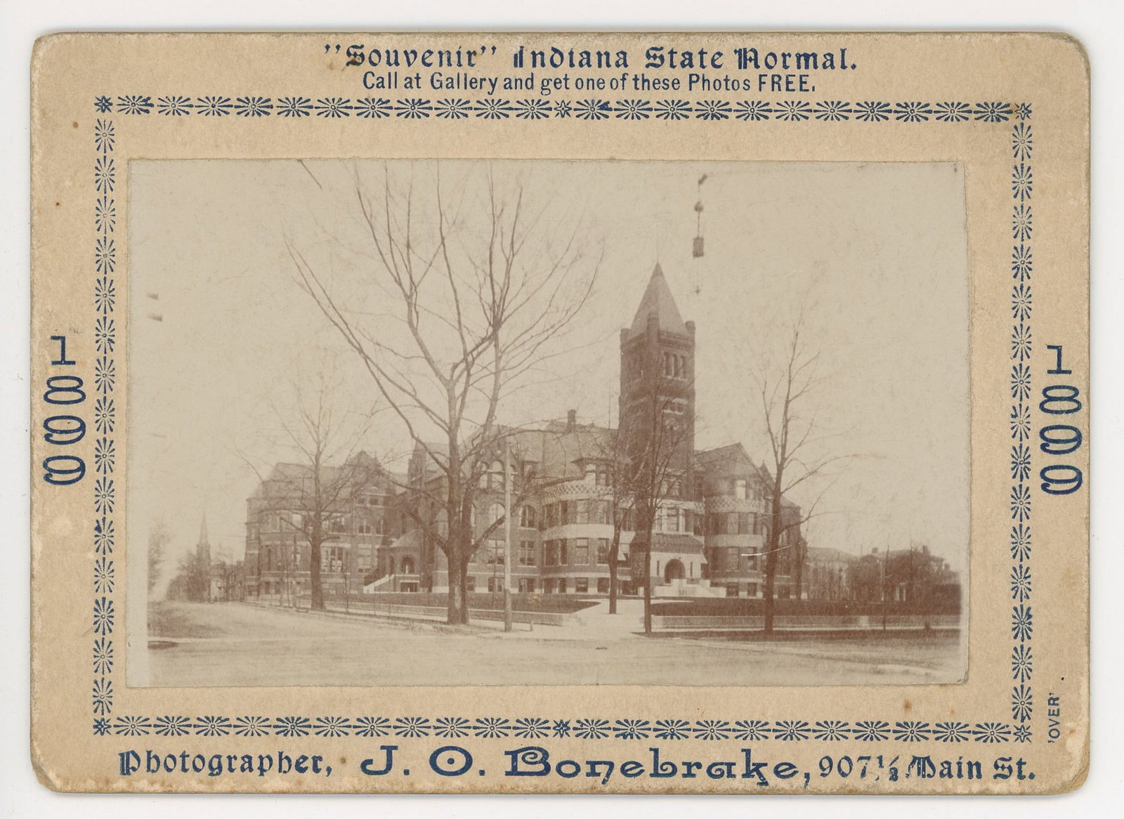 Indiana State Normal Photograph Coupon Card: Albumen photograph showing the main building of Indiana State Normal School, Terre Haute, Indiana, on a promotional mount by J. O. Bonebrake, Photographer, 907½ Main St. Late 19th century. The