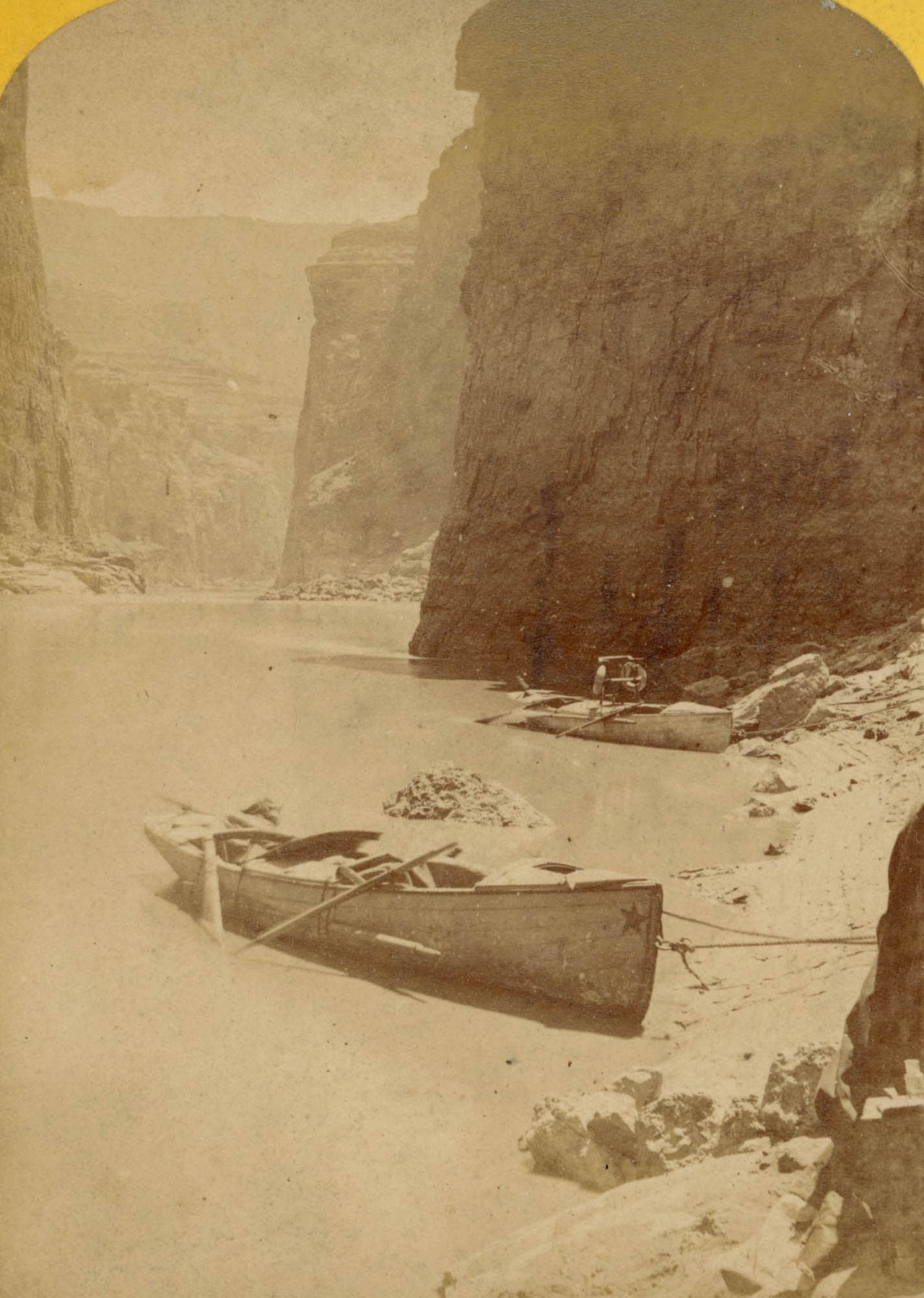 Stereoview, The Canon at Noon, Powell Expedition, Hillers: Two Powell Expedition boats beached on a sandbar in Marble Canyon are documented in this stereoview, No. 181 in the Views on the Colorado River, Marble Canon Series, photographed by Hillers and publis