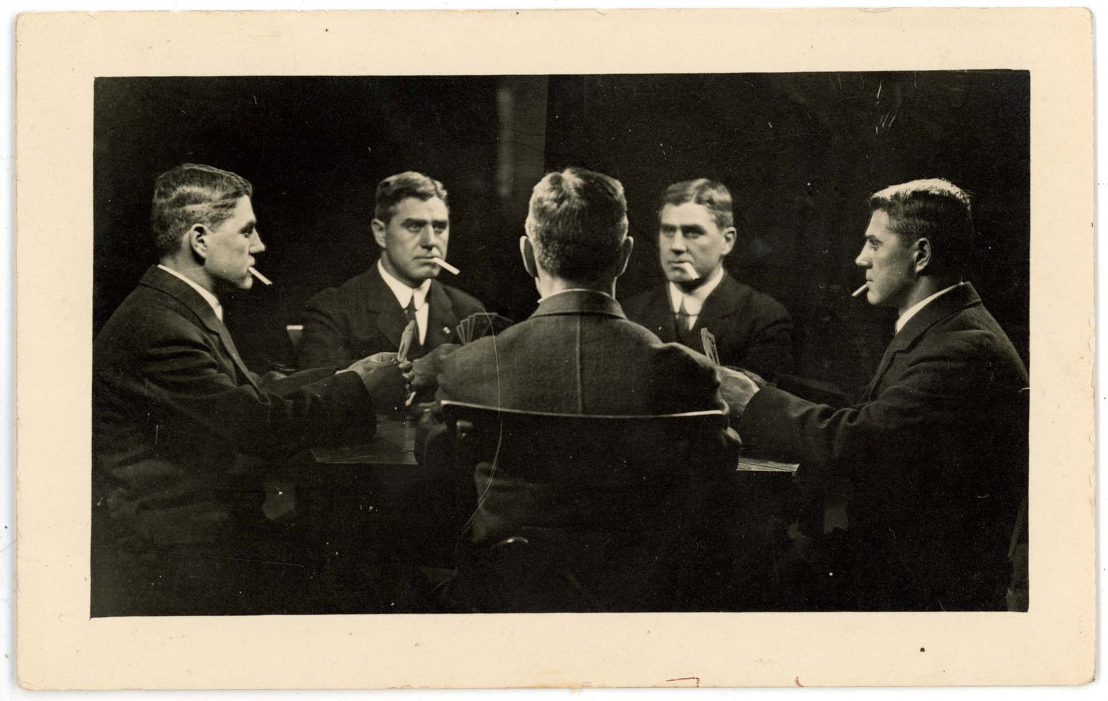 RPPC, Five-Pose Multigraph Card Game, Violet Studio, Louisville: A single unidentified man appears five times in the same composition in this real photo postcard multigraph by The Violet Studio, Fifth and Jefferson Streets, Louisville, Kentucky, the reverse dated O