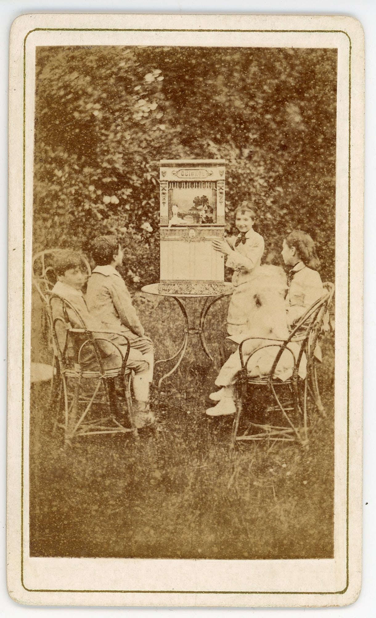 CDV, Children with Guignol Toy Theater, Garden Setting (1 of 3)