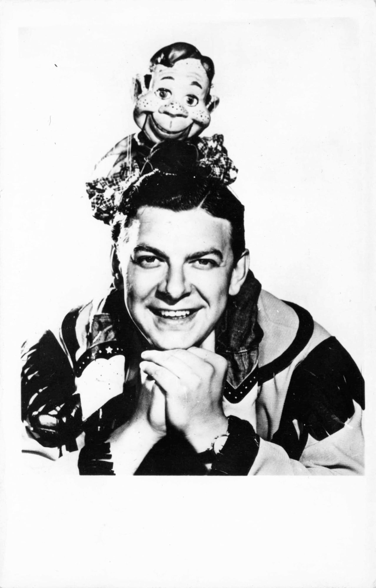 Real Photo Postcard, Howdy Doody and Buffalo Bob Smith, Comic Portrait: Buffalo Bob Smith poses in a striking promotional portrait printed on real photo postcard stock, produced on Kodak paper and likely dating to the mid-twentieth century. The image is constructed as a c