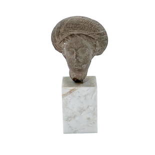 Greek Terracotta Head of Youth 4th to 2nd century BCE: Greek Terracotta Head of YouthCirca 4th to 2nd century BCE. Mounted on marble.Dimensions: 1.75" w x 3" h x 1.5" d