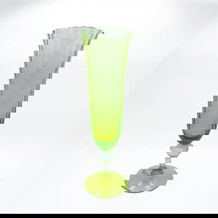 Large Fluted Vintage Uranium Glass Flower Vase: Large Fluted MCM Vintage Uranium/Vaseline Glass Flower Vase, Made in Italy. Turns flourescent green under blacklight.Dimensions: 15" H x 4.5" WWeight: 29 ounces