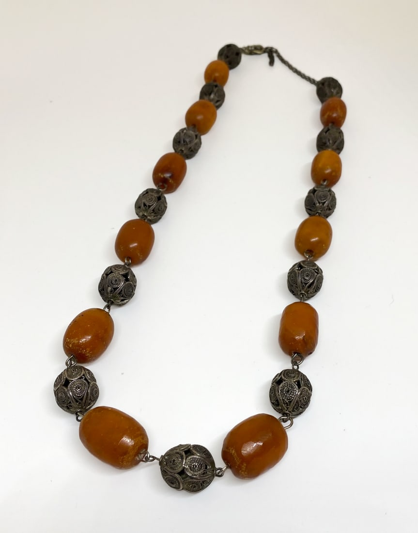 Victorian Antique African Amber Bead: Victorian Antique African Amber bead. 60" .5 silver