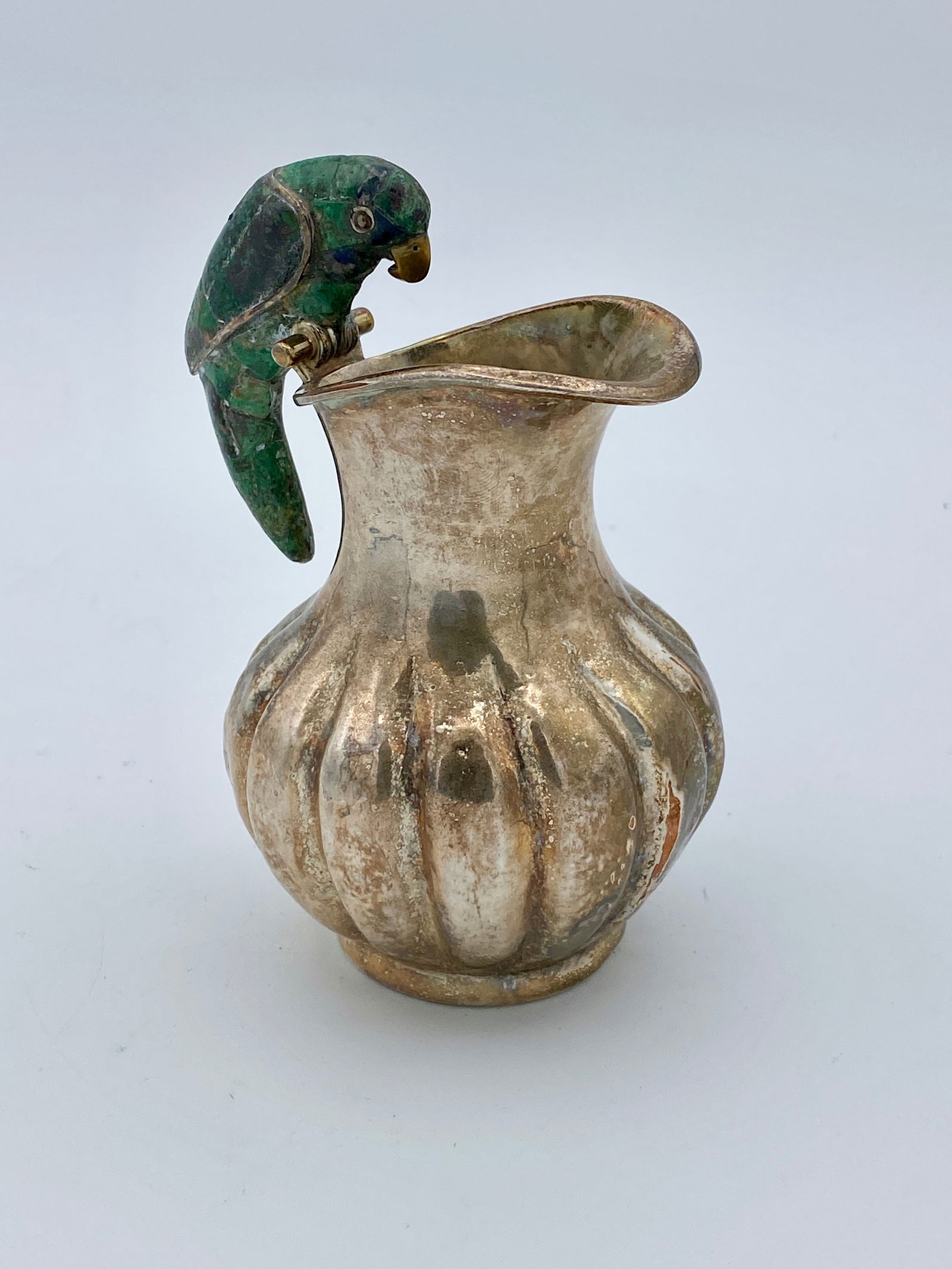 Los Castillos Silver Plated Pitcher with Parrot: Silver plated pitcher w/ Malachite Parrot handle by designer Emilia Castilho, Taxco Mexico. Approximately 4.5 inches tall.