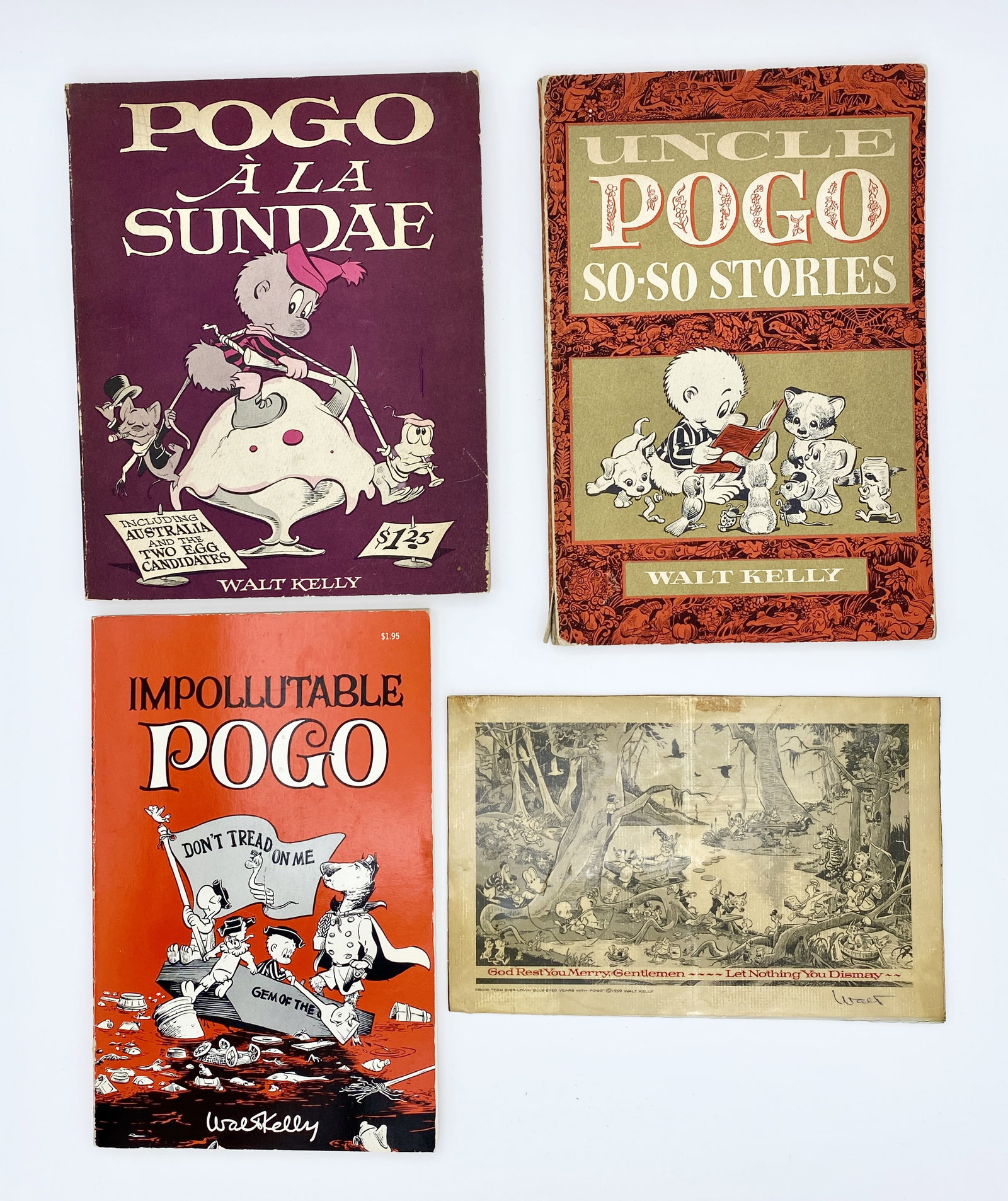 Walt Kelly Comic Books and Ephemera, Lot of 4: Impollutable Pogo by Walt Kelly, 1970. Paperback, First Printing. 6 x 9 x 0.5 inches. Signed by author to Mell Lazarus, creator of Momma and Miss Peach. Title page signature has been cut out and